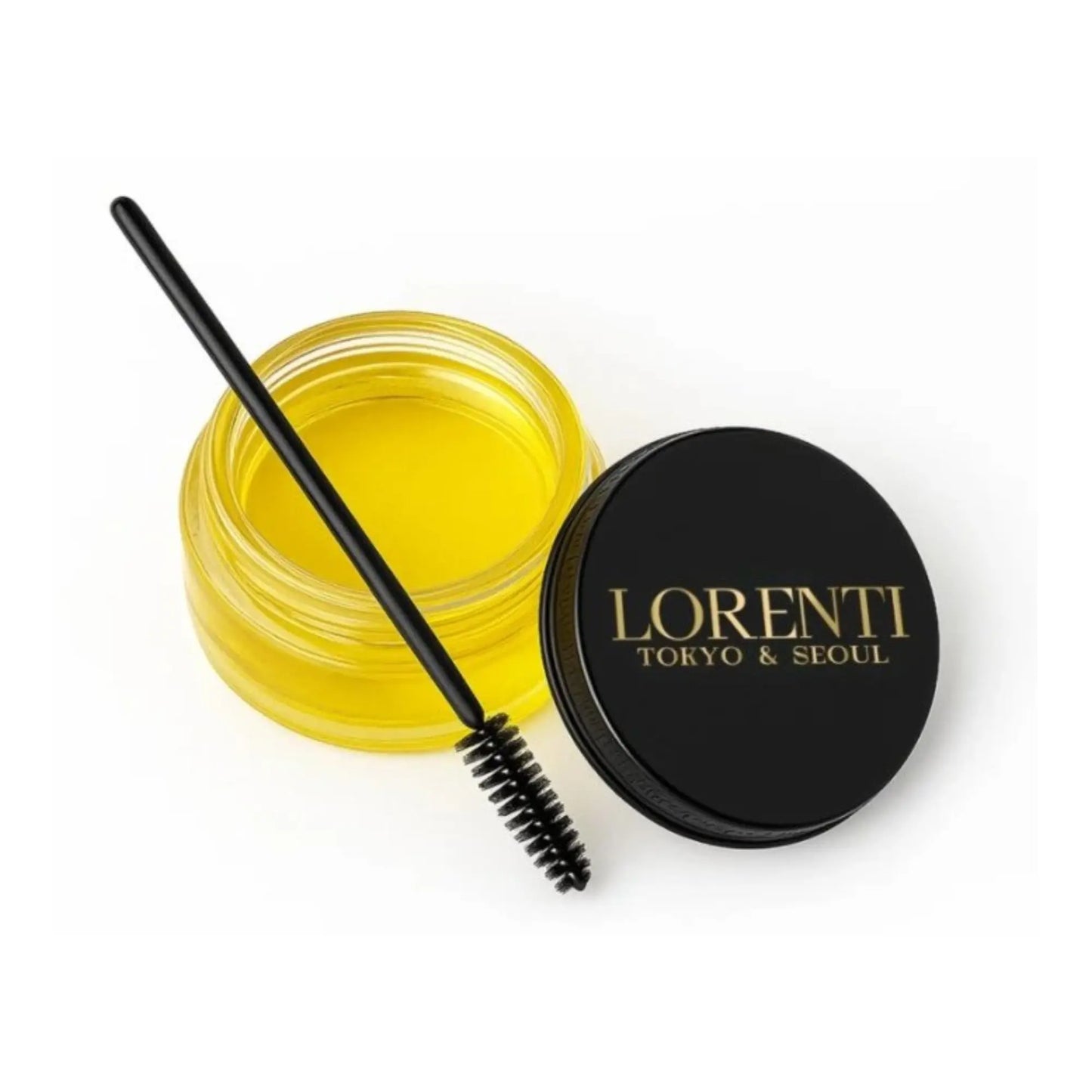 Yellow cosmetic product with a black applicator and Lorenti lid on a white background